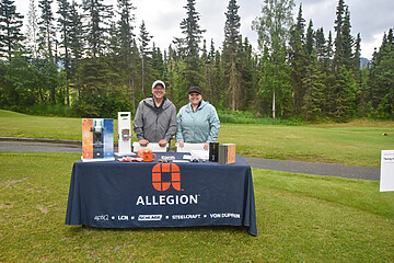 Allegion showcases innovative security solutions at a lively outdoor promotional event.