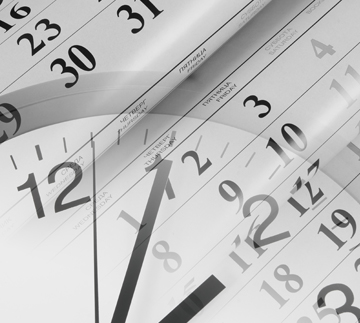 Grayscale clock and calendar design symbolizing time management and the passage of time.